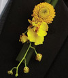Yellow Orchids of Romance Boutonniere
